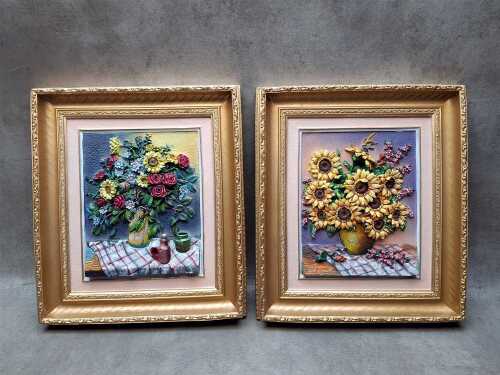 Two wall mounted 3D paintings