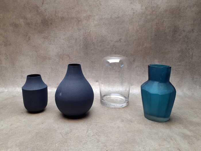Four decorator vases in blue tones