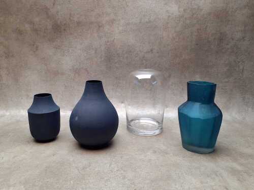 Four decorator vases in blue tones