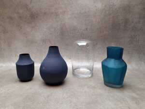 Four decorator vases in blue tones