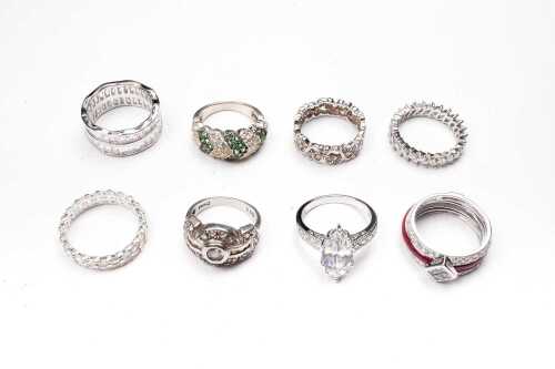 A collection of eight rings in sterling silver