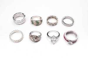 A collection of eight rings in sterling silver