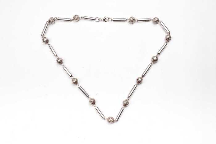 A fancy link necklace in sterling silver.