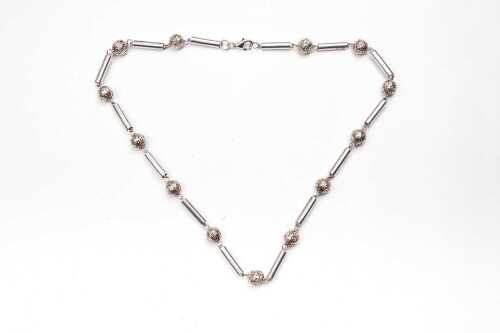 A fancy link necklace in sterling silver.