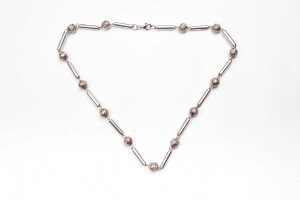 A fancy link necklace in sterling silver.