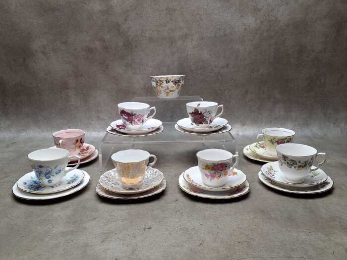 Eight English porcelain trios