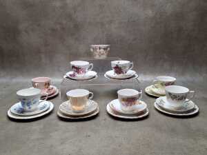 Eight English porcelain trios