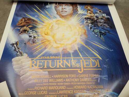 Assorted movie posters including Star Wars