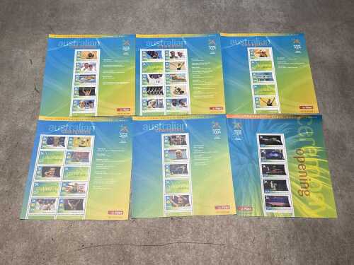 Two Australian Gold Medalist stamp albums