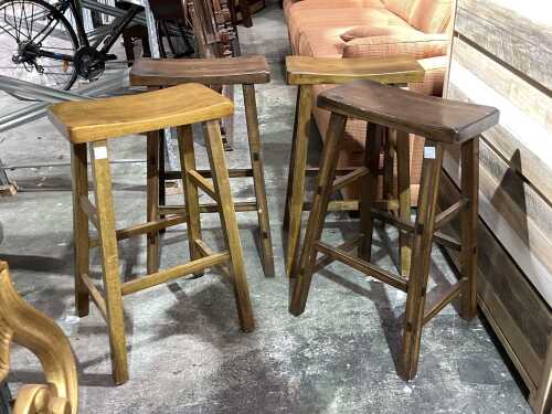 Four hardwood saddle style counter chairs
