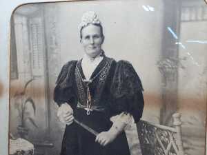Antique photographic studio portrait of a standing woman - 2
