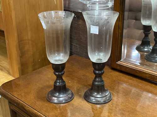 Two vintage-style hurricane candle holders