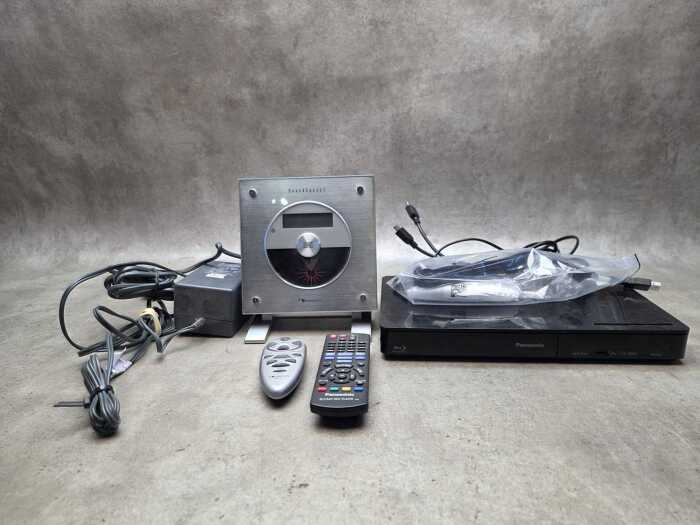 Two multimedia players including Nakamichi SoundSpace 1 standing CD player