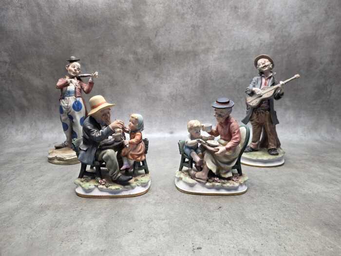Group of Capodimonte porcelain figures