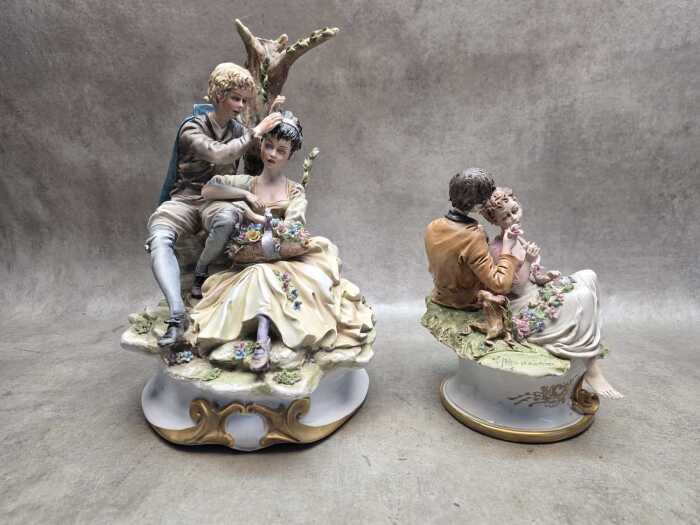 Two Capodimonte porcelain figural groups of young lovers.
