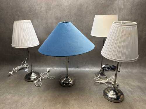 Four chromed table lamps