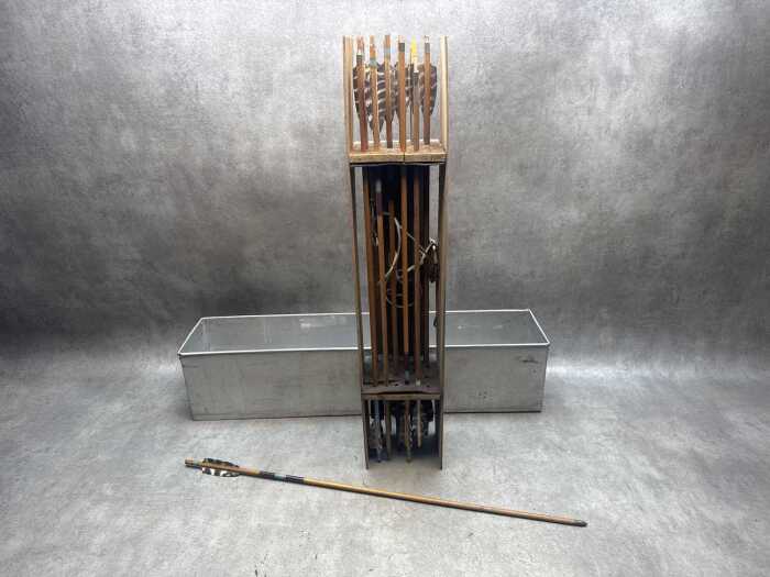Collection of arrows with metal tips and feather fletches