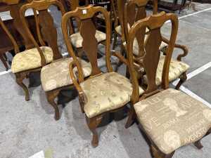 Eight Queen Anne style chairs