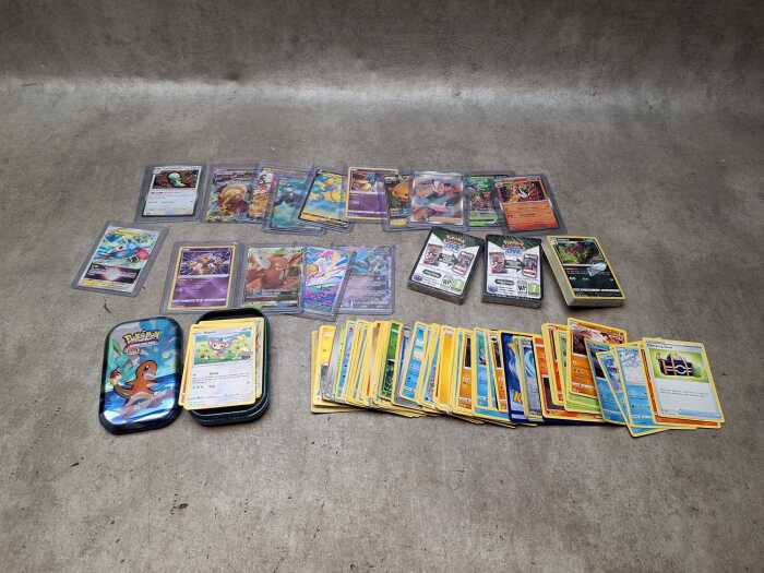 Group of Pok&eacute;mon cards, including sealed