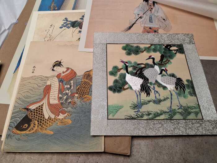 Assorted unframed Asian artworks, mostly Japanese woodblock prints