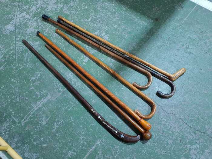 Seven antique timber walking sticks