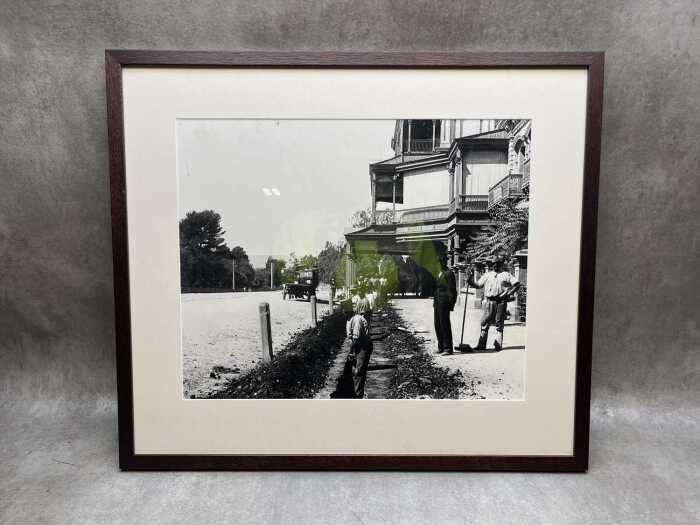 Black and white reproduction of early Australian photograph (The road makers).