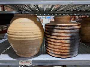 Two hand-made rustic terra cotta pots