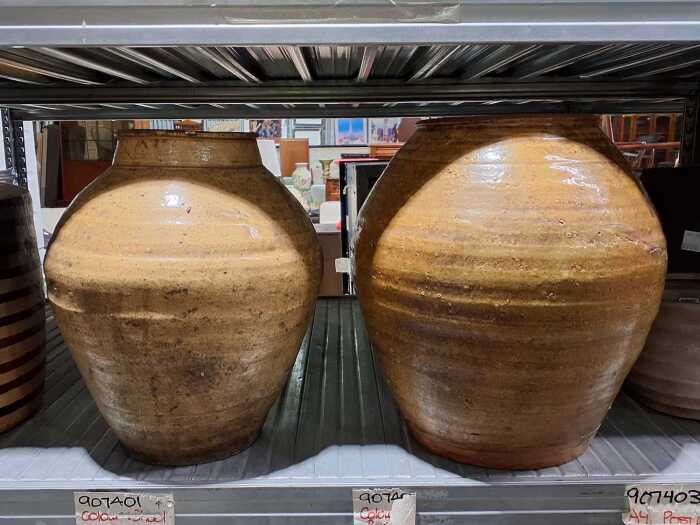 Two hand-made rustic terra cotta pots