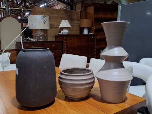 Three contemporary ceramic vessels in Earth tones