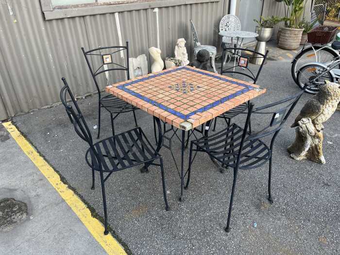 Four-piece wrought iron patio set