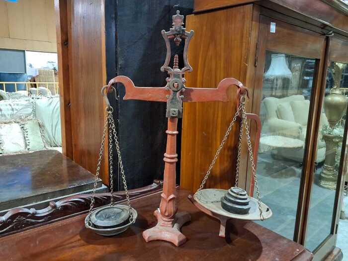 Antique cast iron balance scales with weights