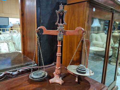 Antique cast iron balance scales with weights