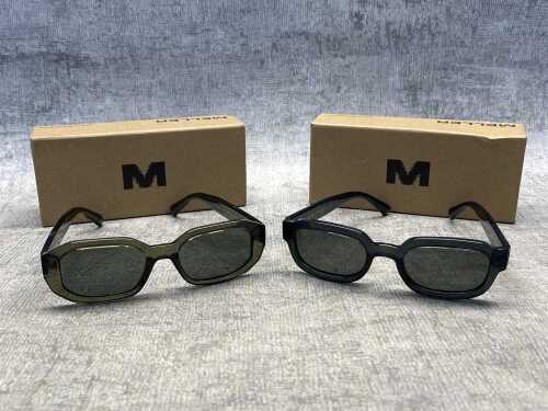 Two pairs of Meller sunglasses