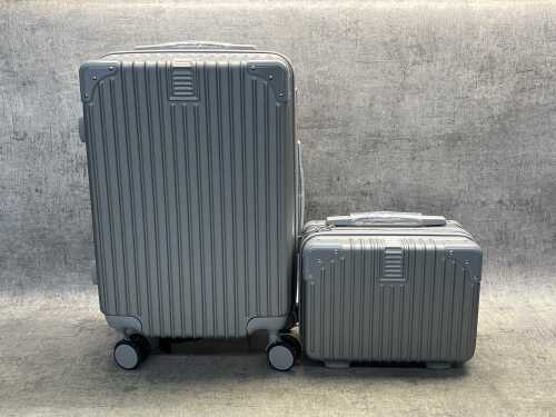 Small suitcase with matching carry bag