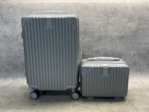 Small suitcase with matching carry bag