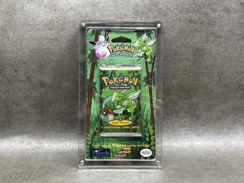 Pok&eacute;mon 1999 Jungle first edition booster pack with acrylic case