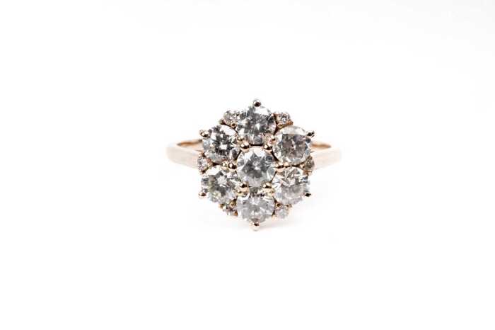 A diamond ring in 14 carat yellow gold