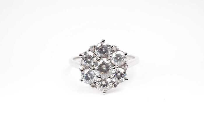 A diamond cluster ring in 14 carat white gold