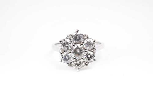 A diamond cluster ring in 14 carat white gold