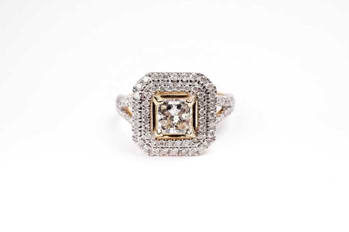 A diamond ring in 14 carat yellow gold
