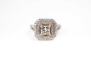 A diamond ring in 14 carat yellow gold