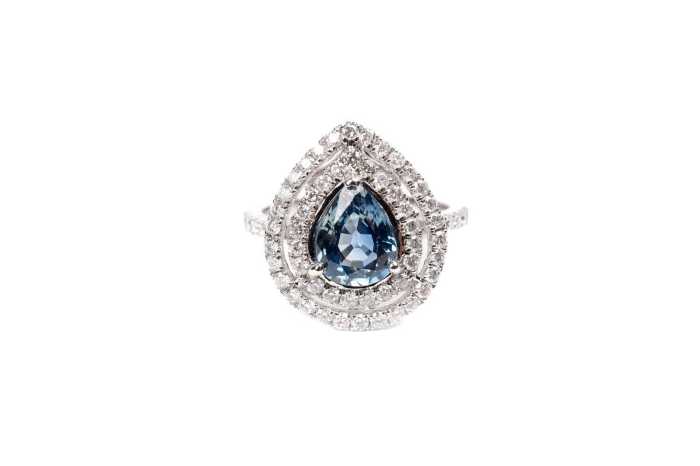 A Ceylon sapphire and diamond ring in 14 carat white gold