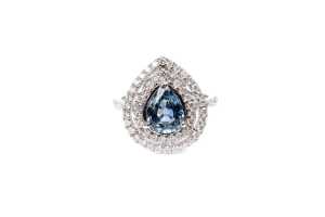 A Ceylon sapphire and diamond ring in 14 carat white gold