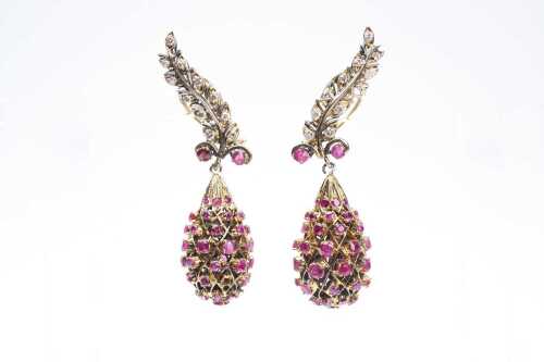 A pair of vintage ruby and diamond earrings in 14 carat yellow and white gold
