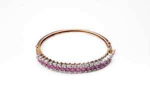 A ruby and diamond bangle in 14ct yellow and white gold - 2