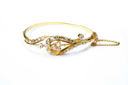 A vintage diamond bangle in 22 carat yellow gold.