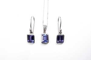 A tanzanite pendant and earring set in 18 carat white gold