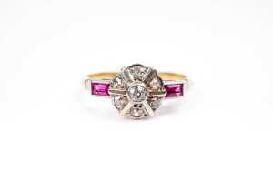 An Art Deco diamond and ruby ring in 18 carat yellow gold