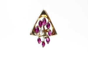 A ruby and diamond pendant 14 carat yellow gold