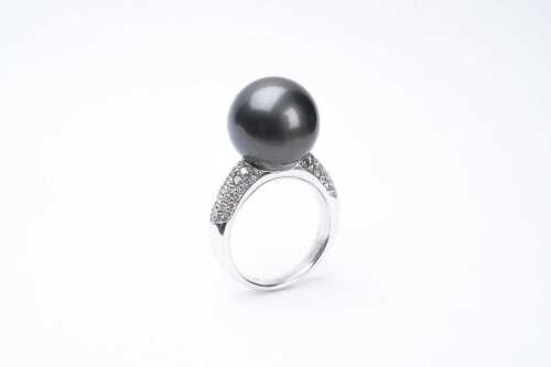 A Tahitian pearl and diamond ring in 18 carat white gold
